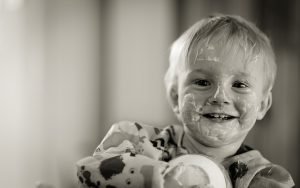 Toddler with food on face