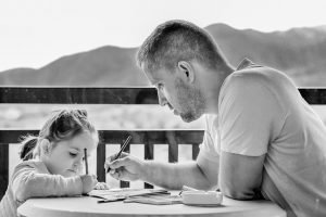 Dad teaching daughter