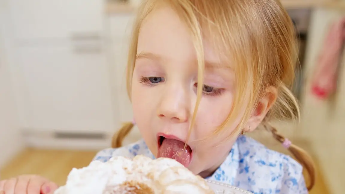 Why Is My Toddler Licking Everything? 5 Reasons