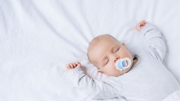 baby asleep with pacifier