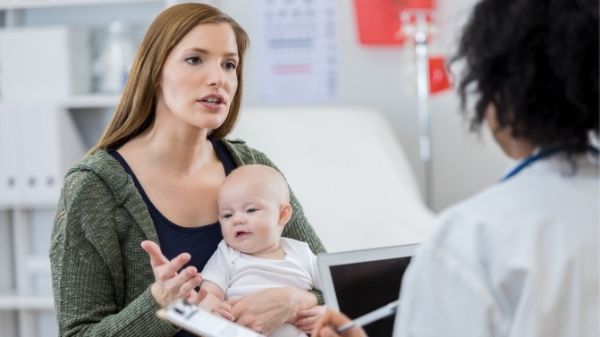 mom with baby and doctor