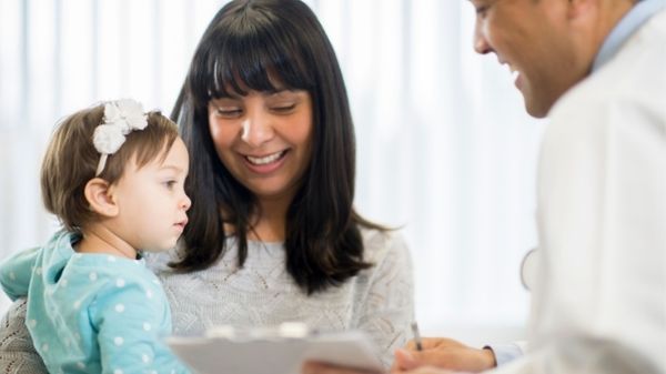 toddler with doctor