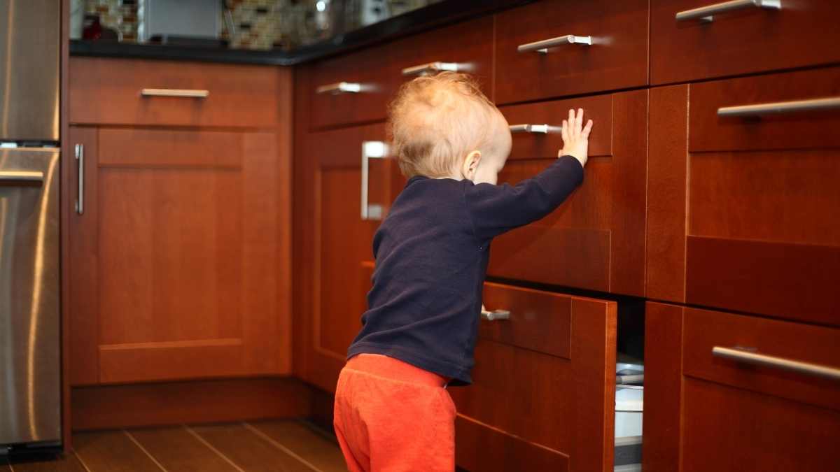 toddler opening drawer