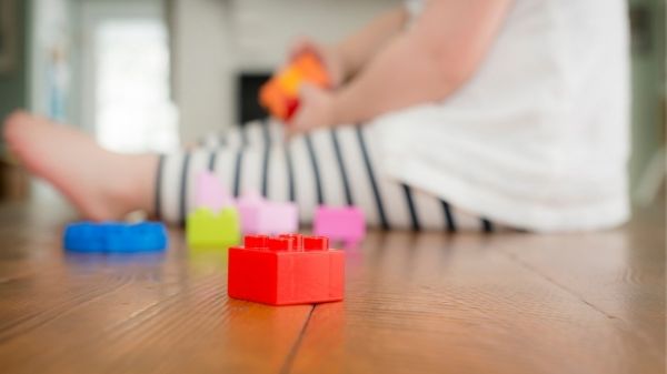 toddler playing lego