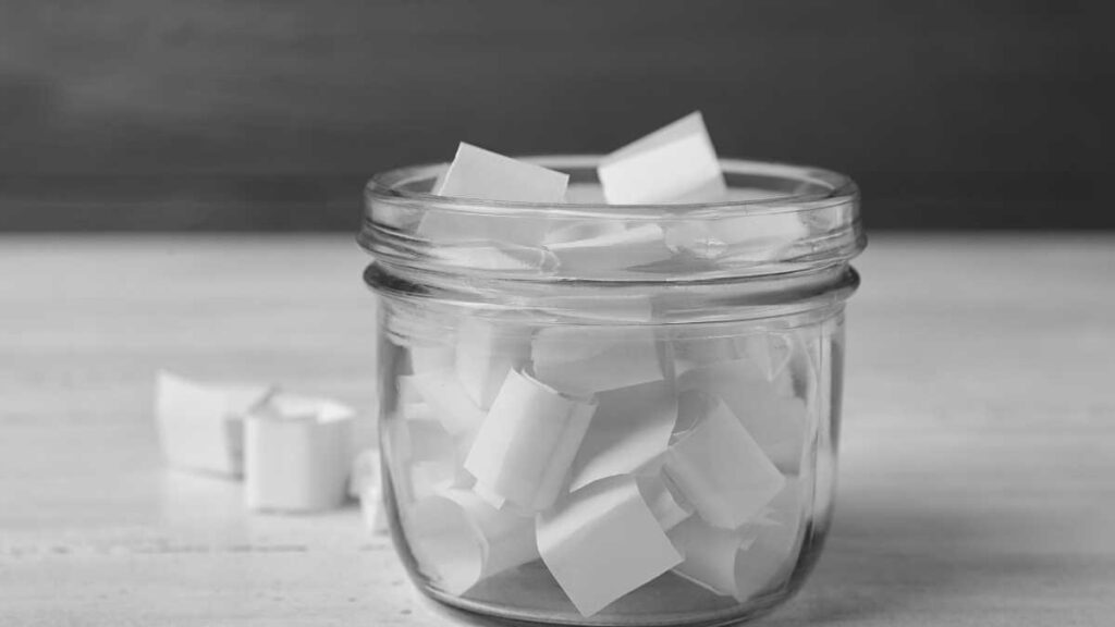 jar with paper in in