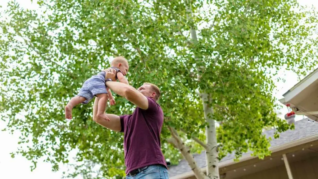 dad playing with toddler outside (1)