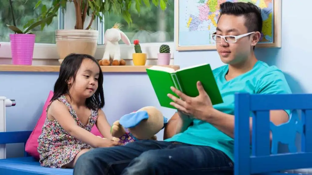 dad reading with toddler