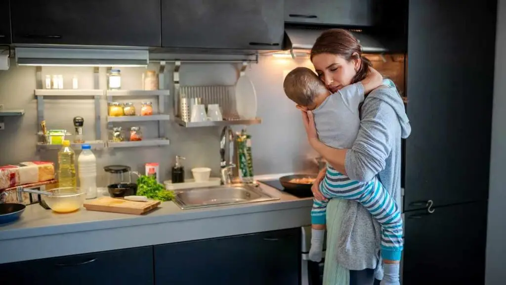 toddler showing affection by hugging