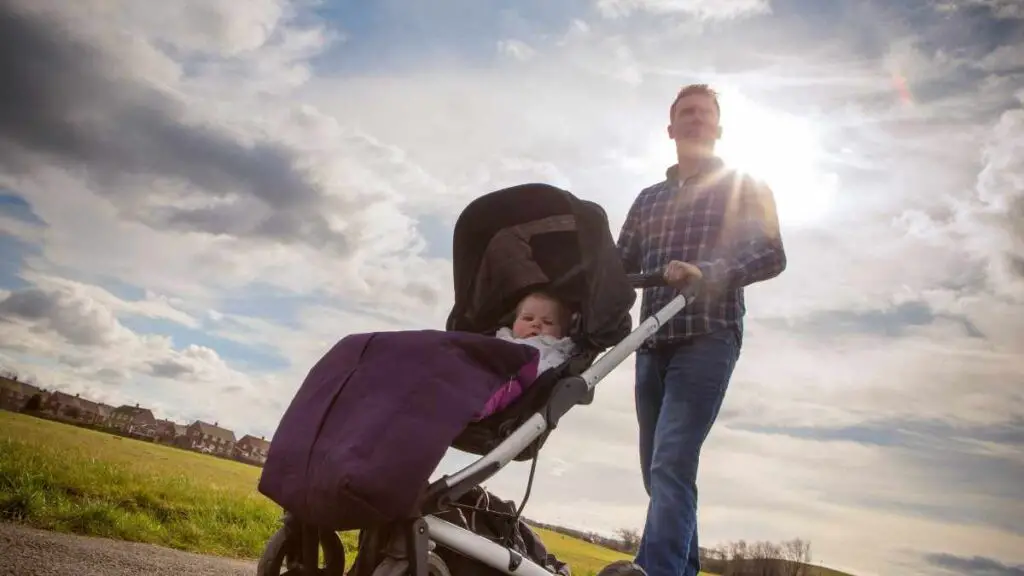 husband walking baby