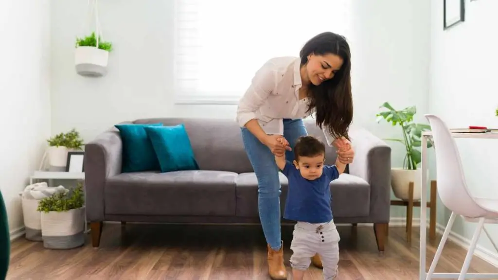 mom walking with baby