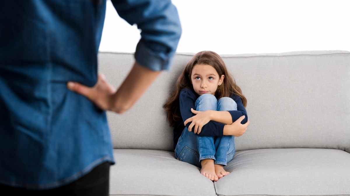 signs of bad parent - scared girl on couch