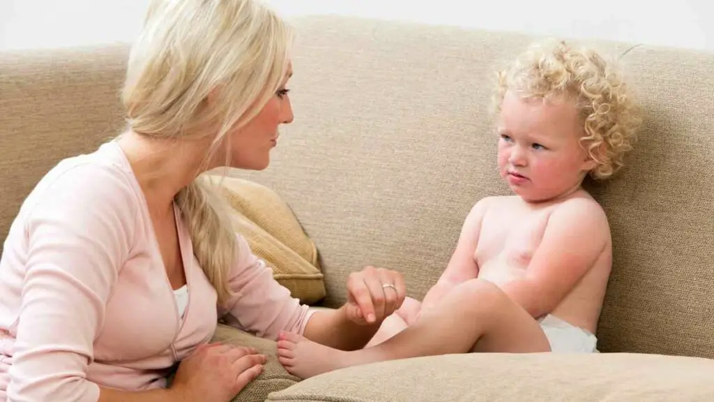 toddler being told off