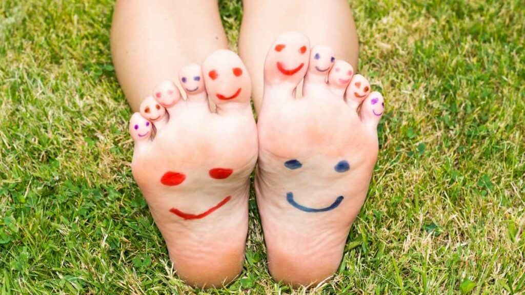 toes painted with feelings on