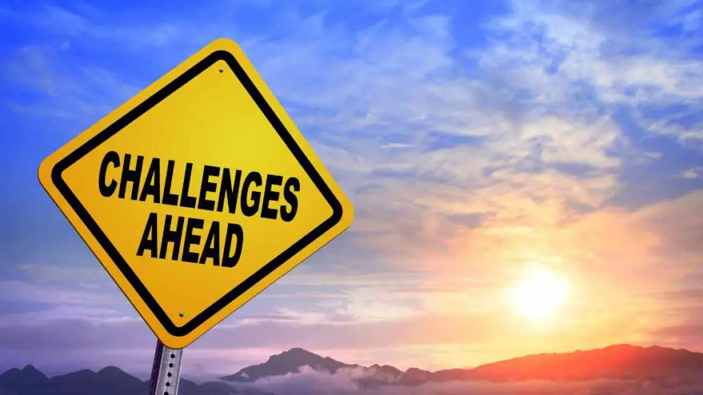 sign saying challenges ahead